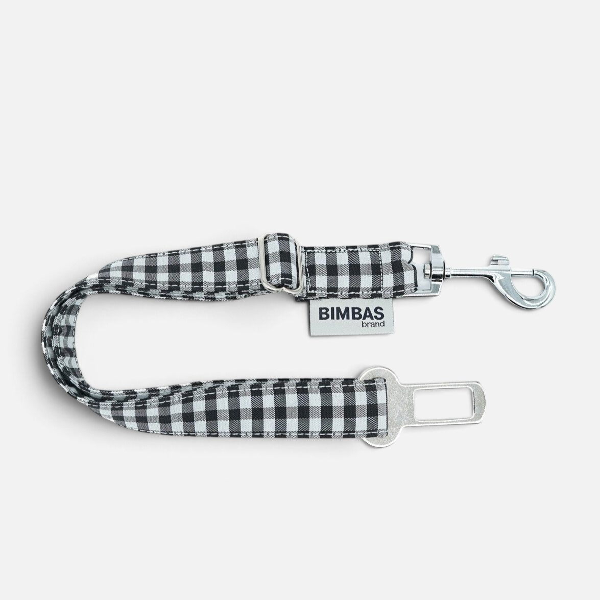 Cinturón de seguridad para perros BIMBAS BRAND con estampado de cuadros vichy en blanco y negro y hebilla metálica