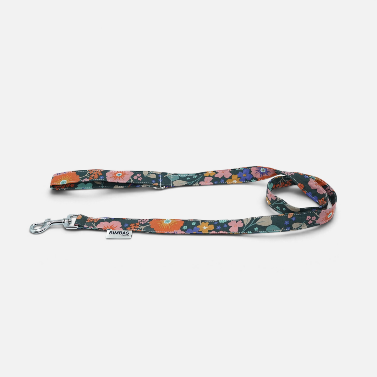 Collar martingale BIMBAS BRAND con estampado floral colorido sobre fondo oscuro, resistente y con anillas de metal.