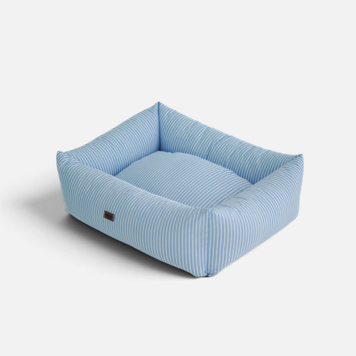 Cama para perros BIMBAS BRAND en color azul con estampado de rayas, impermeable, desenfundable y hecha a mano.