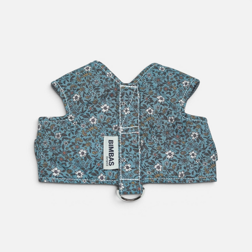 Arnés chaleco BIMBAS BRAND de algodón azul con estampado floral, malla transpirable y cierres metálicos ajustables.